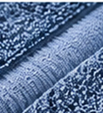 Close-up of blue terry weave and a sewn fabric edge
